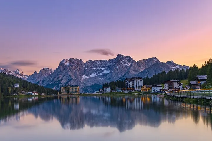 Lake Misurina at dusk, the Sorapiss range reflected under a violet sky