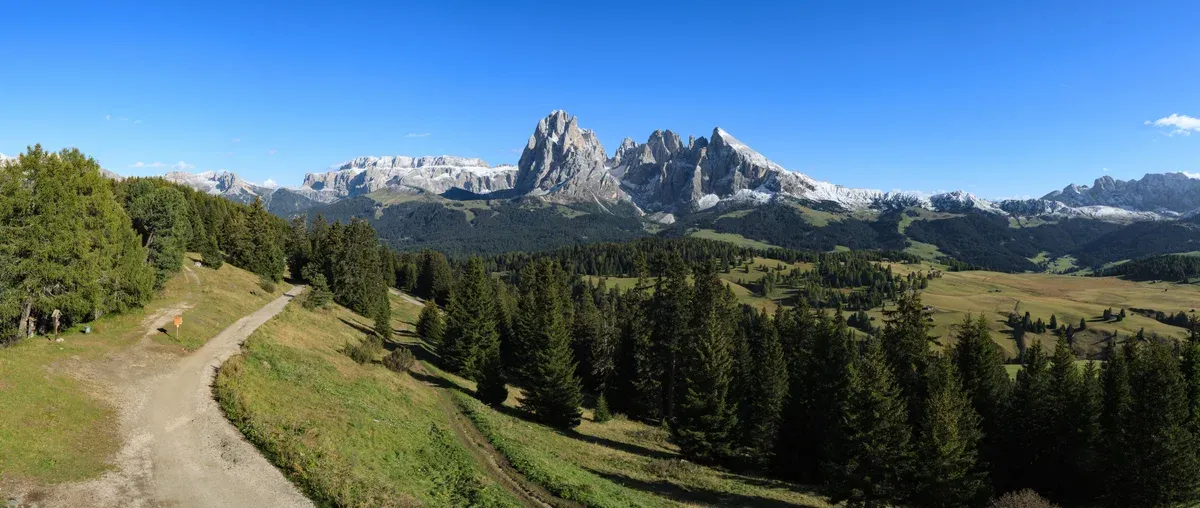 Seiser Alm meadows with the Sella and Langkofel groups in the distance, a full-day stop when planning how many days in the Dolomites