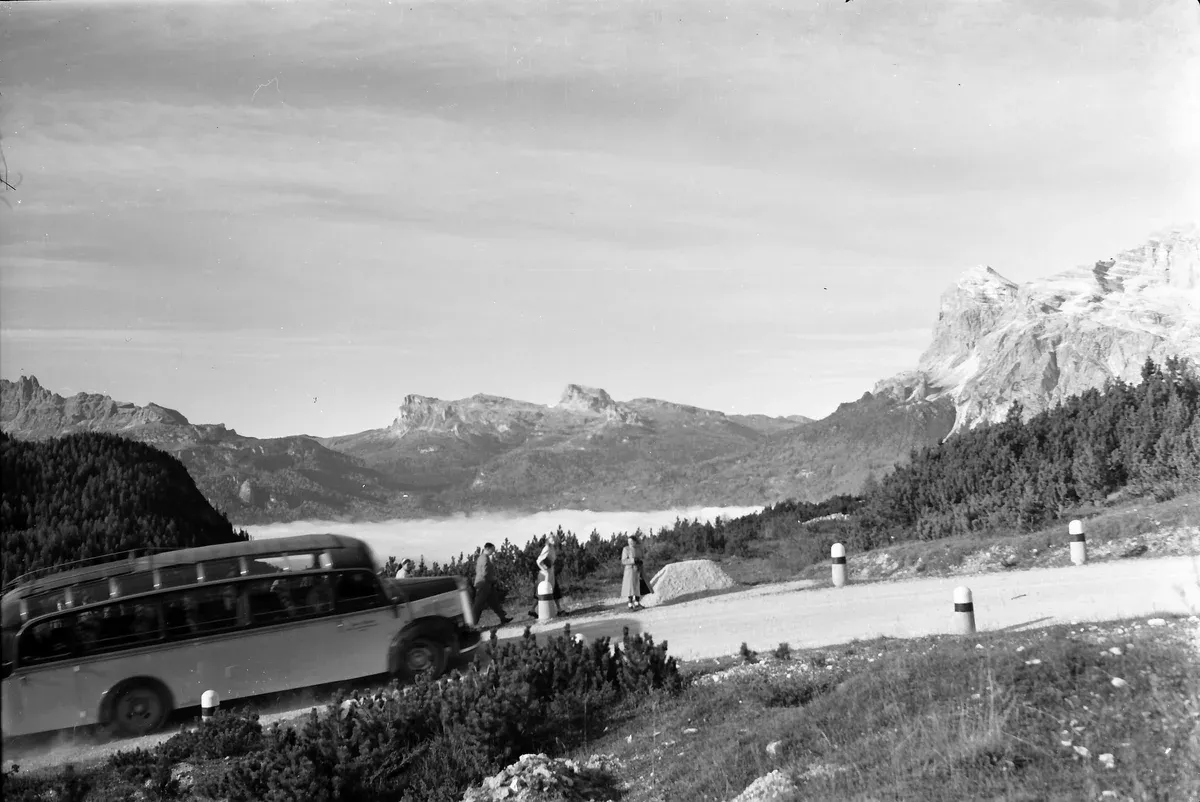 Historic coach on the mountain road at Passo Tre Croci above Cortina, the road into the Dolomites when you travel from Venice by bus